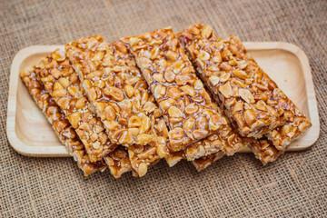 Peanut sesame snack, (Tua gra joak) sweet peanuts stick. © tachjang