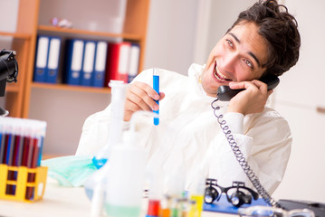 Young biochemist working in the lab 