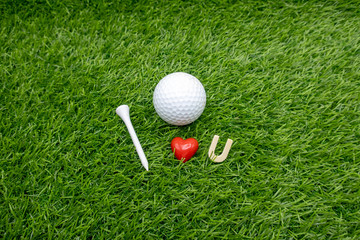 Golf I love you with golf ball on green grass