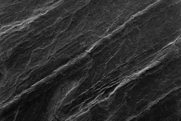 Black stone surface background. For design And as a background