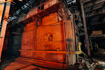 Old brick industrial stove for melting glass in abandoned  factory 