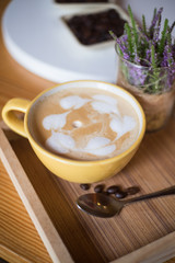 Obraz na płótnie Canvas Hot coffee in cups, sugar and cakes