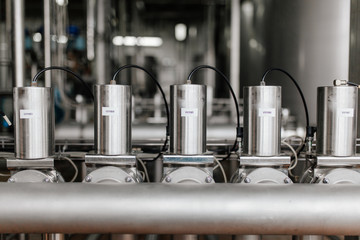 Production of milk and yogurt at the plant. Metal units and tanks for storage and transportation.