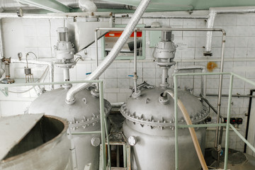 Production of milk and yogurt at the plant. Metal units and tanks for storage and transportation.