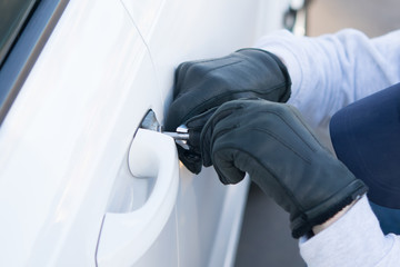 breaking the door lock of the car, for further theft, close-up