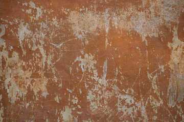 battered old house wall on the street