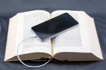ebook - open book and phone 