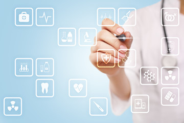 Medical icons on virtual screen. Modern technology in medicine.