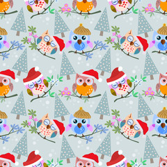 Owl with christmas hat and tree on branch aesmless pattern