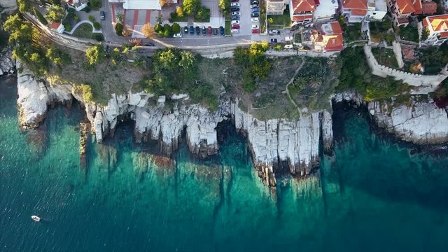 Aerial top view of cliff with seascape at Kavala - Greece