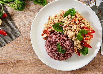 Fried rice with chicken basil on the table