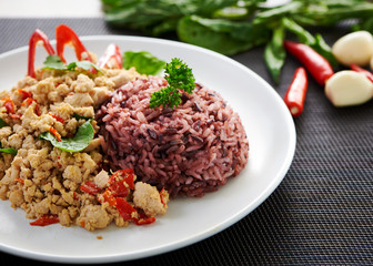 Fried rice with chicken basil on the table