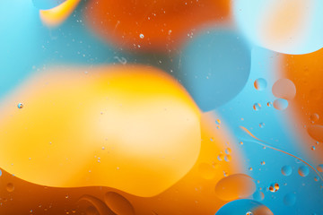 macro of oil drops on water background texture abstraction