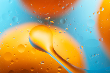 macro of oil drops on water background texture abstraction