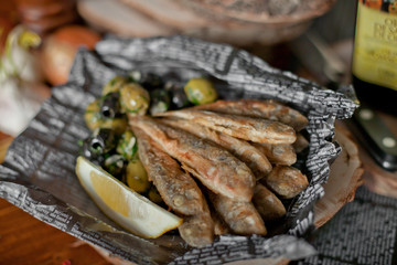 dish with fried fish on a table