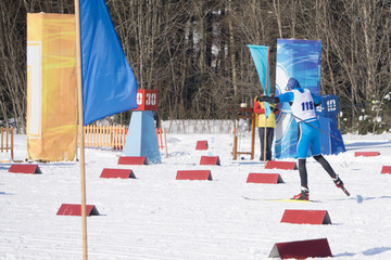 Olympic athlete from the team at the finish at the mass start in the men's 15 km 15 km Skiathlon winter .