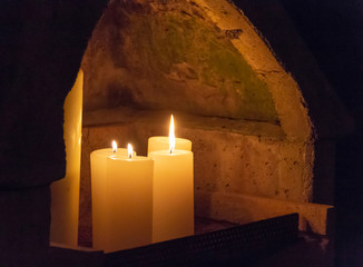 niche with burning candles