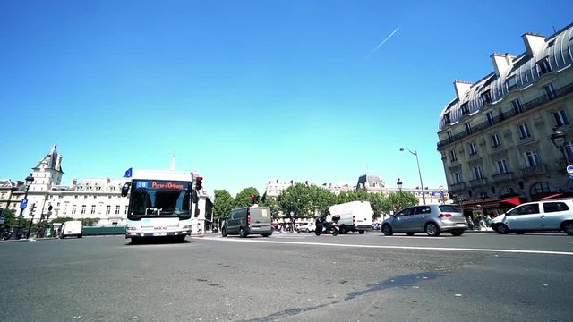 Public Bus Traveling Near The Notre Dame In Paris, Slow motion