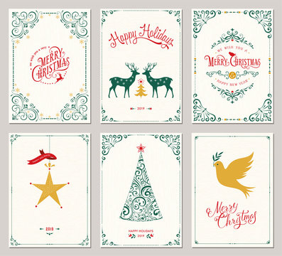 Ornate vertical winter holidays greeting cards with New Year tree, reindeers, Christmas ornaments, dove, swirl frames and typographic design. 