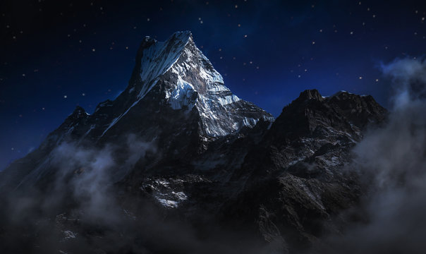 Machapuchare at night. A mountain in the Annapurna Himalayas of north central Nepal. Digitally editing image