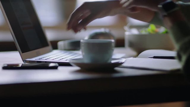 business woman using smartphone taking photo of coffee on mobile phone camera sharing social media lifestyle enjoying relaxing at home typing laptop computer close up hands