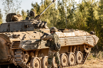 group of soldiers on tanks on the Outdoor on army exercises. war, army, technology and people...