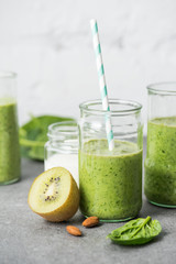 Blended green and organic smoothie in glasses