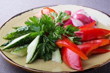 Sliced and cut vegetables served on a plate