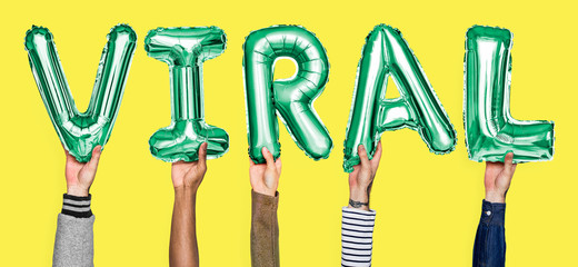 Green alphabet helium balloons forming the text privacy