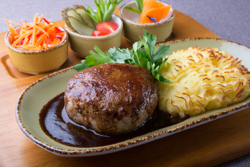 Beef meat cutlet served with mashed potaotes and