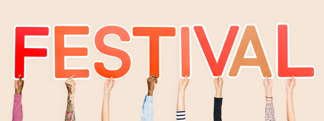 Hands holding the word festival