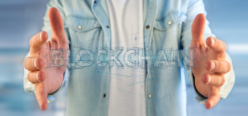 Man holding a Blockchain title isolated on a background