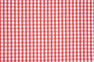 Red picnic cloth background.