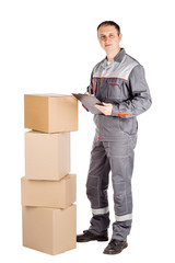 male builder in a helmet with cardbox