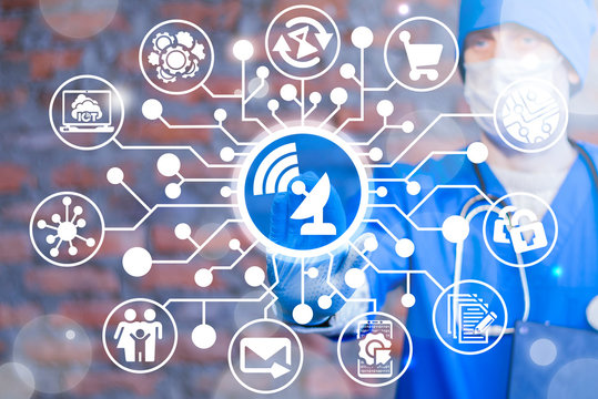 Male doctor pushing a antenna button on a virtual microchips screen. Modern medical telecommunication. Wireless telecom medicine hospital connection.