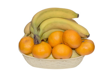  ripe tangerines and bananas in a basket isolated