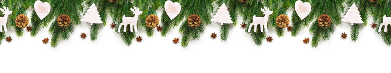 Obraz na płótnie Canvas Christmas tree branches on white background as a border