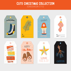 Collection of Christmas gift tags and labels templates. Happy New Year cheerful lettering. Lovely winter illustration with cute and character traditional elements in scandinavian style. Vector