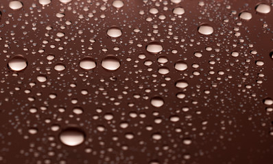 Water drops on a red background