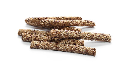 Pretzel bread sticks with sesame and linen, flax seeds isolated on white background