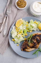 Fried chicken breast with spices