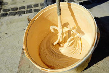 Materials and tools for the repair of the facade of the building.