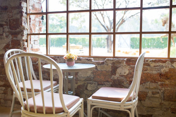 Round table and chairs in cafe vintage style
