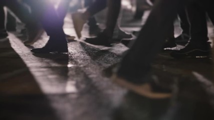 People on crosswalk in busy city street at night slomo - Powered by Adobe