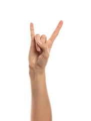 Female hand showing "devil horns" gesture on white background