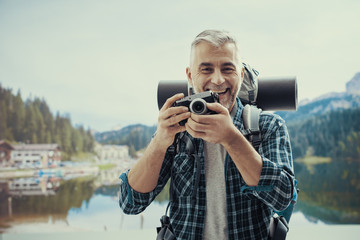 Explorer shooting pictures in nature