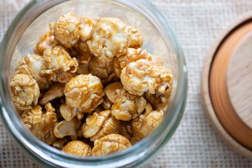 Popcorn caramel in glass jar