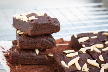 Dark chocolate brownies with almond topping.