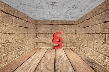 Paragraphsymbol gegen eine stein Wand