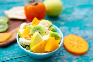 A healthy and delicious salad with various fruits. 